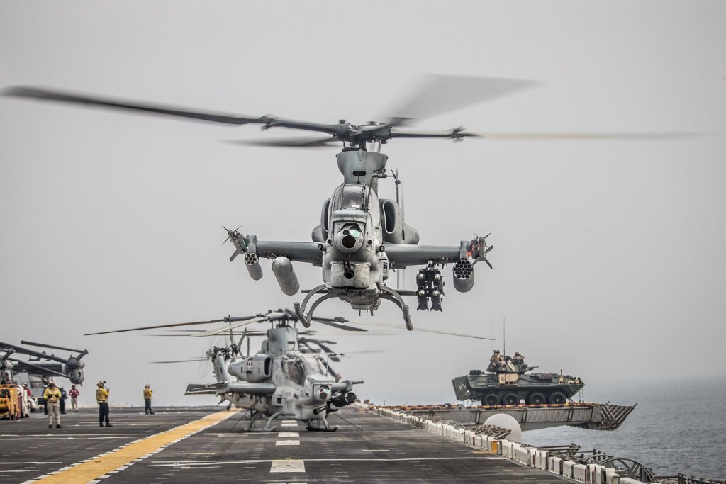 190812-M-EC058-1148 STRAIT OF HORMUZ (Aug. 12, 2019) An AH-1Z Viper attached to Marine Medium Tiltrotor Squadron (VMM) 163 (Reinforced), 11th Marine Expeditionary Unit (MEU) takes off during a strait transit aboard the amphibious assault ship USS Boxer (LHD 4). The Boxer Amphibious Ready Group and the 11th MEU are deployed to the U.S. 5th Fleet area of operations in support of naval operations to ensure maritime stability and security in the Central Region, connecting the Mediterranean and the Pacific through the Western Indian Ocean and three strategic choke points. (U.S. Marine Corps photo by Lance Cpl. Dalton S. Swanbeck/Released)