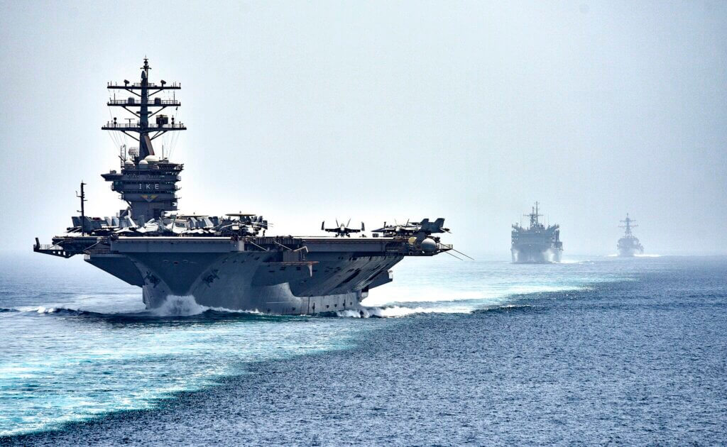 160721-N-OR652-449
STRAIT OF HORMUZ (July 21, 2016) The aircraft carrier USS Dwight D. Eisenhower (CVN 69), followed by the fast combat support ship USNS Arctic (T-AOE 8) and the guided-missile destroyer USS Nitze (DDG 94), transit the Strait of Hormuz. The Eisenhower Carrier Strike Group is deployed in support of maritime security operations and theater security cooperation efforts in the U.S. 5th Fleet are of operations. (U.S. Navy photo by Mass Communication Specialist 3rd Class J. Alexander Delgado/Released)